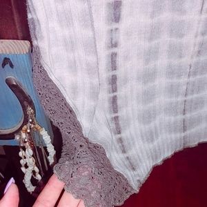 This is a grey blouse shirt.